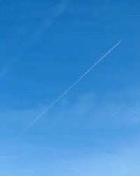 Low angle view of vapor trail in sky