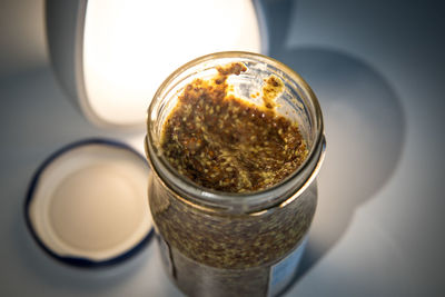High angle view of coffee in glass on table