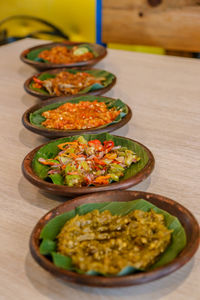 High angle view of chili sauce in plate on table