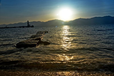 Scenic view of sea against sky during sunset