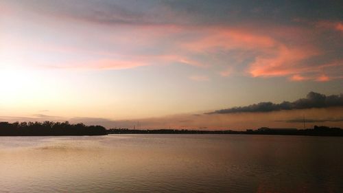 Scenic view of silhouette landscape against sky at sunset