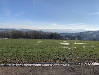 Scenic view of field against sky