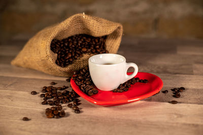 Close-up of coffee cup on table