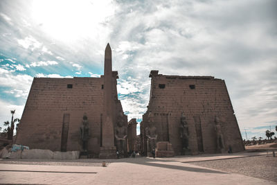 Historic building against cloudy sky