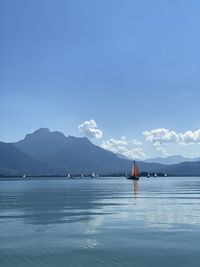 Scenic view of sea against blue sky