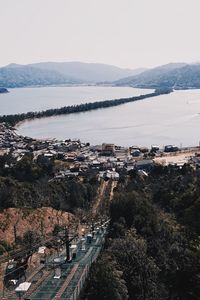 High angle view of buildings and mountains against sky