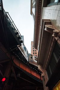 Low angle view of skyscrapers against sky