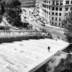 High angle view of people walking on street in city