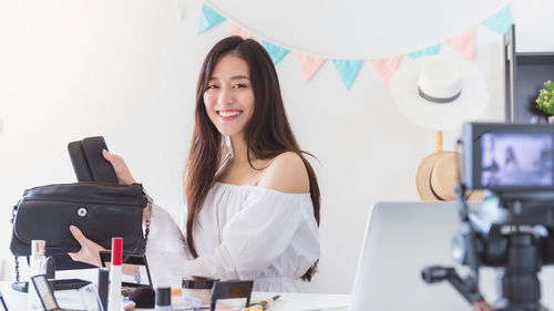 Portrait of a smiling young woman