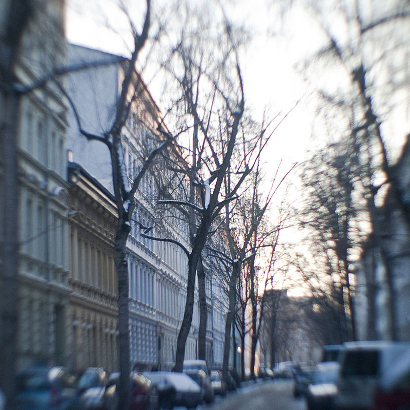 VIEW OF CITY STREET WITH SNOW