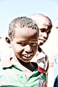 Close-up portrait of smiling boy