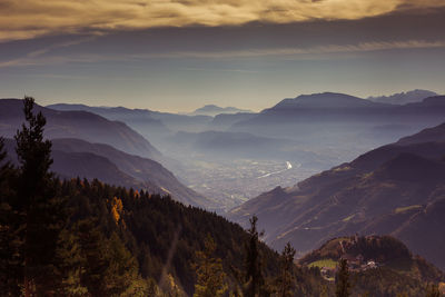 Scenic view of mountains against sky during sunset