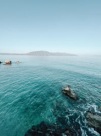 Scenic view of sea against clear sky