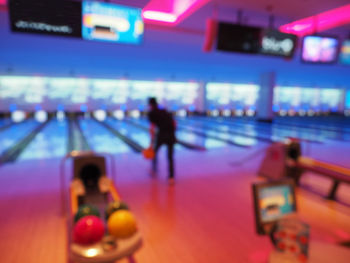 Defocused image of people at nightclub