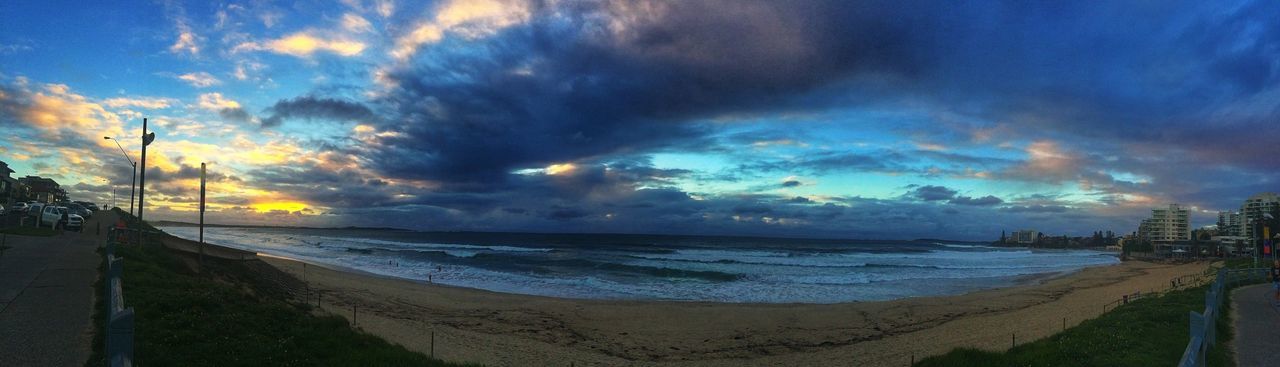 sea, beach, sky, water, shore, horizon over water, scenics, cloud - sky, beauty in nature, tranquil scene, tranquility, sand, sunset, nature, cloudy, incidental people, idyllic, cloud, coastline, panoramic