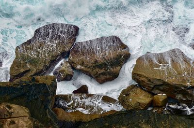 Rocks on shore at beach