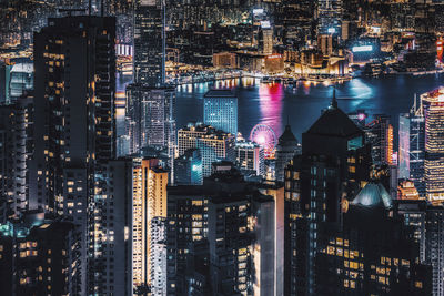 High angle view of illuminated buildings at night