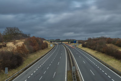 Empty road against sky