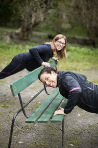 Young women training on bench