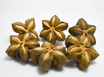 Close-up of candies against white background