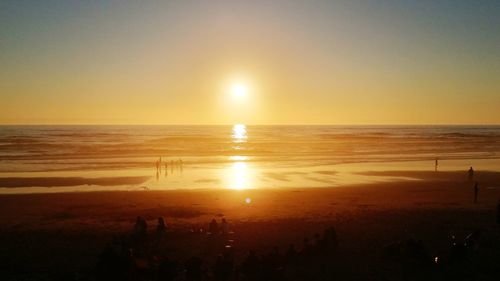 Scenic view of beach during sunset