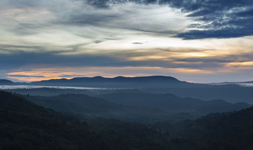 Scenic view of mountains against sky during sunset