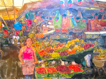 Woman standing in market stall