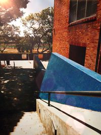 View of swimming pool in front of house