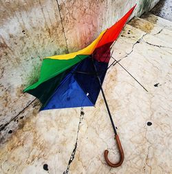High angle view of multi colored flag on floor