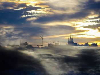 View of cloudy sky over city