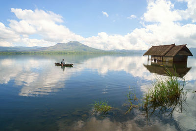 Reflection of clouds in calm lake