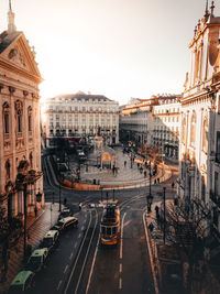 High angle view of city street and buildings against sky