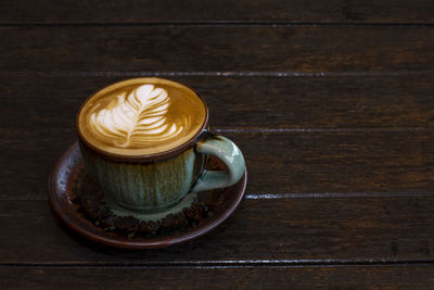 High angle view of cappuccino on table