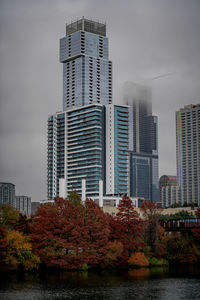 Modern buildings in city against sky