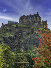 Low angle view of historical building against sky in edinburgh