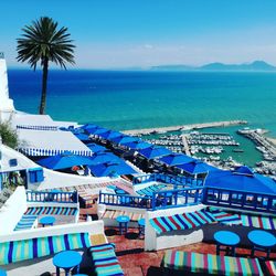 Scenic view of sea against blue sky