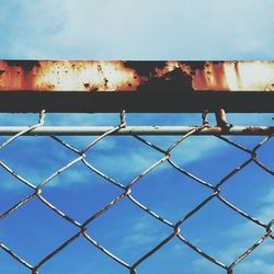 Low angle view of chainlink fence