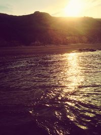 Scenic view of sea against sky during sunset