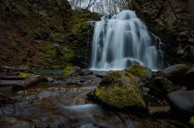 Scenic view of waterfall in forest