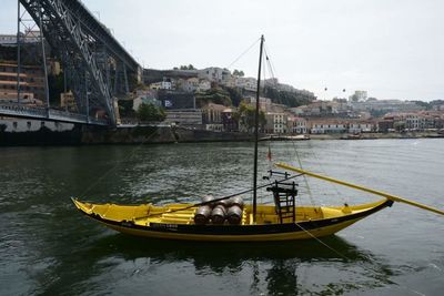 Nautical vessel on water in city