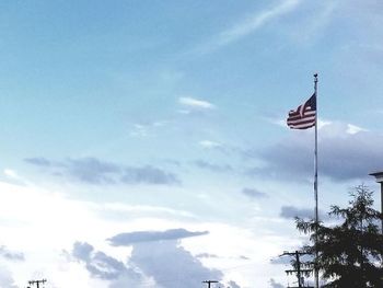 Low angle view of flag against sky