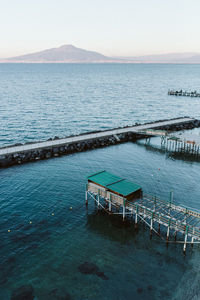 High angle view of pier over sea against sky