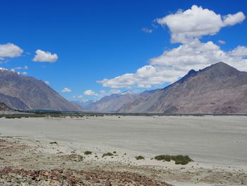 Scenic view of desert against sky