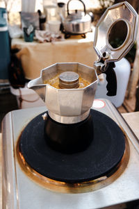 Close-up of mocha pot is a pressurized espresso shot coffee kettle. 