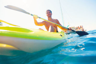 Portrait of smiling man in sea