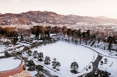 Scenic view of snow covered mountains against sky