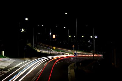 Light trails on road at night