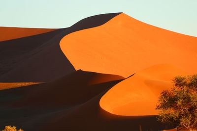 Scenic view of orange sky