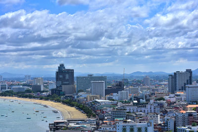 High angle view of buildings in city against sky