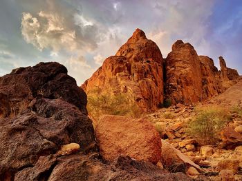 Panoramic view of rocks and mountain against sky